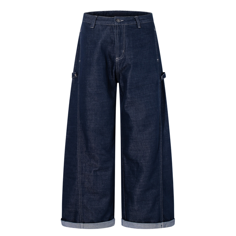 Front view of deep-indigo wide-leg jeans with cuffed hems and utility side tabs