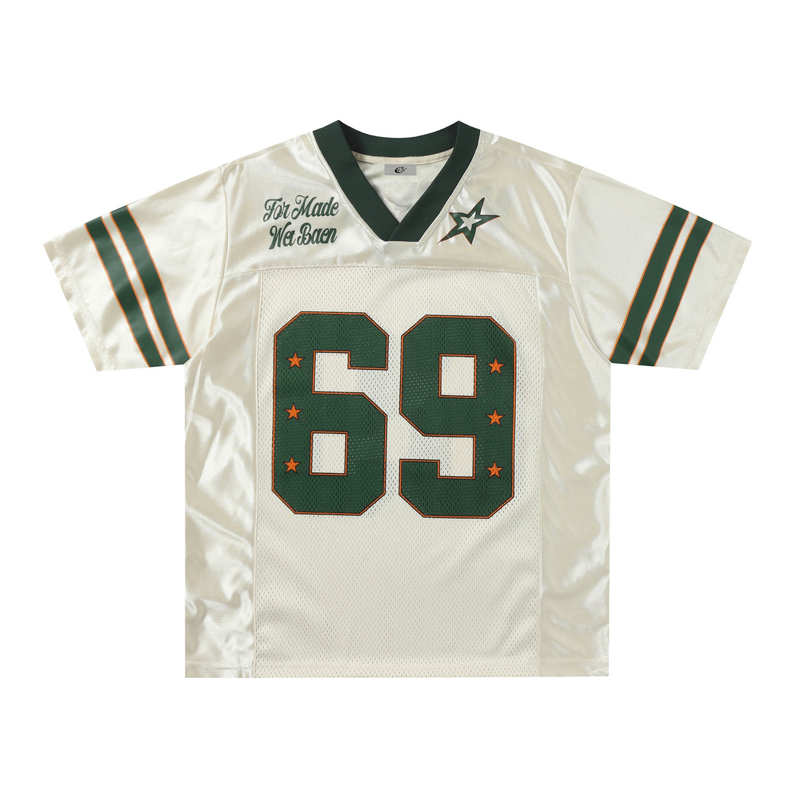 Cream retro football jersey tee with dark green trim, orange-striped sleeves, and large number 69 graphic
