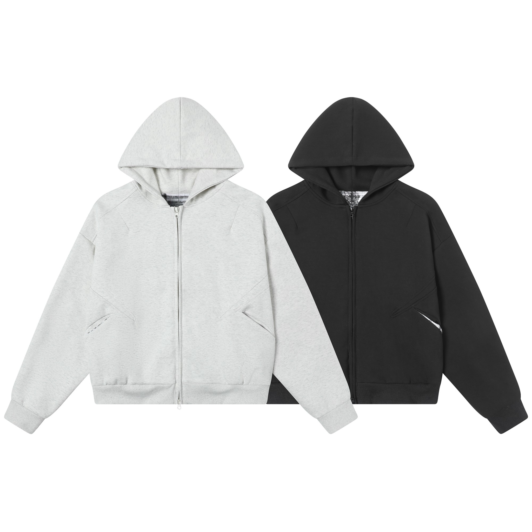 Light grey marl and black structured panel zip-up hoodies with angled pockets and sculpted seam detailing