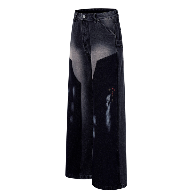 Dark wash wide-leg jeans with brushstroke fade pattern, angled front view
