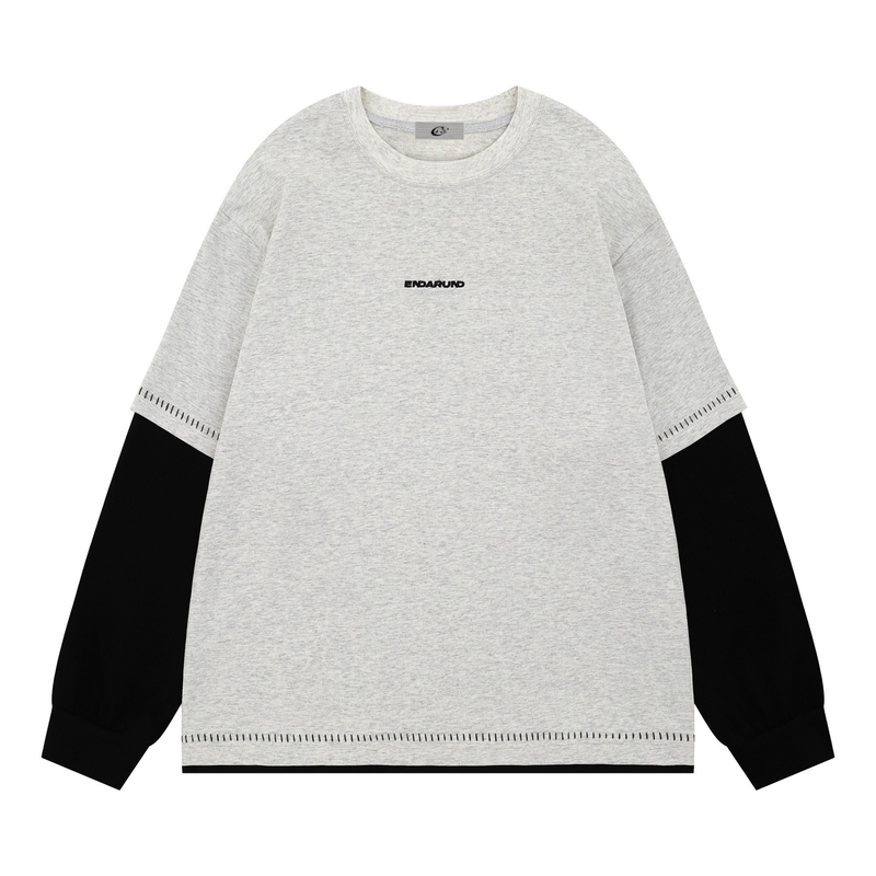 Front view of heather gray layered crewneck tee with black sleeves and stitched hems