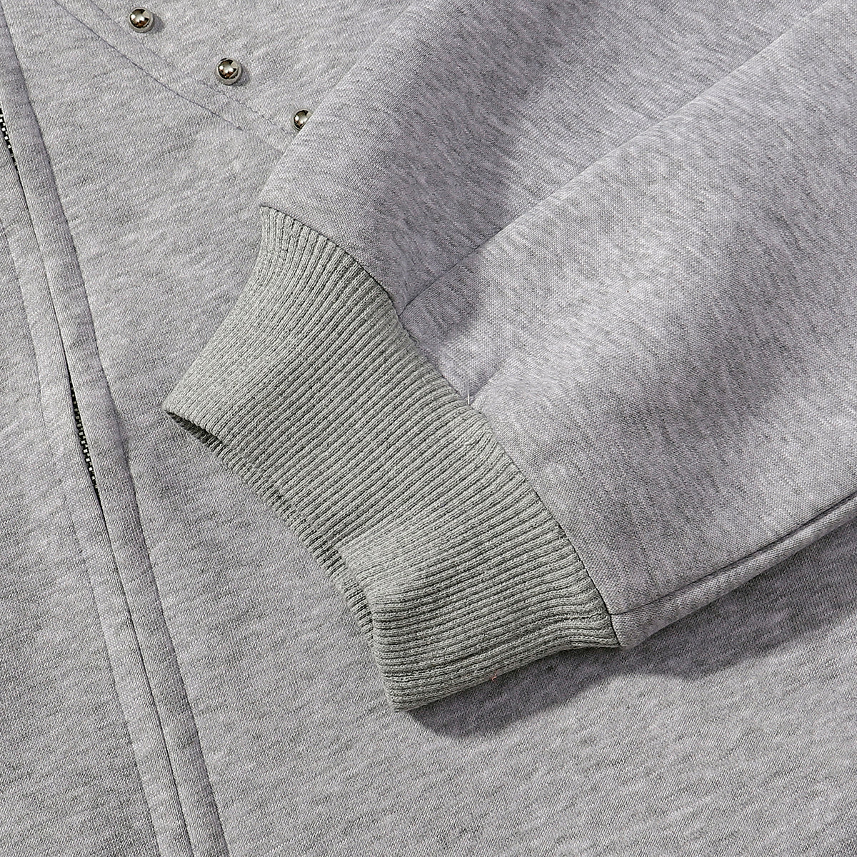 Omirad Studded Arc Zip Hoodie | Metal Stud Detail Streetwear