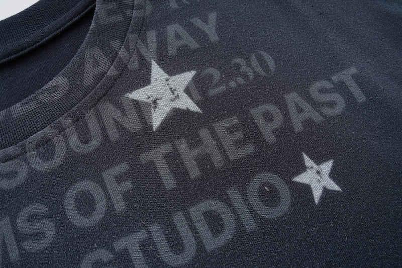 Dark navy graphic T-shirt with faded star print and distressed Virosem Studio lettering across the chest