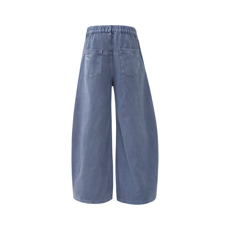 Back view of blue wide leg jeans with elastic waistband and patch pockets