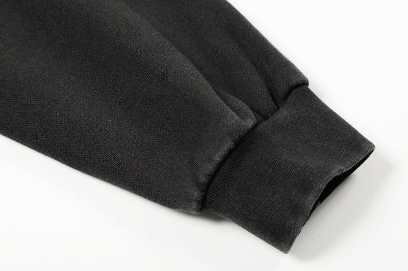 Close-up of black hoodie sleeve cuff