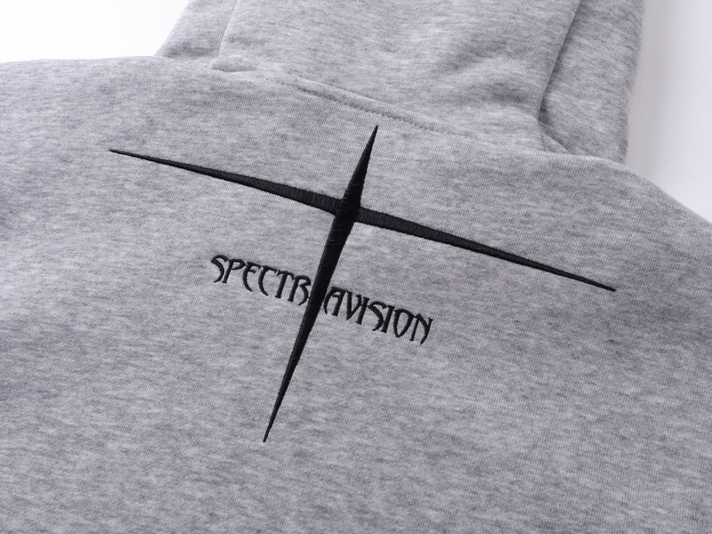 Close-up of gray hoodie back graphic with black cross and Spectravision text