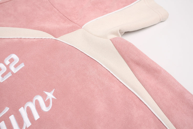 Pink suede athletic tee with cream panel detailing and white embroidered logo on soft streetwear fabric