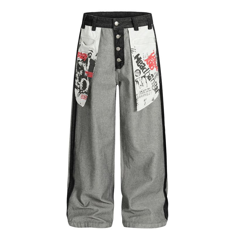 Front view of gray wide-leg jeans with black contrast panels and graphic patch pockets
