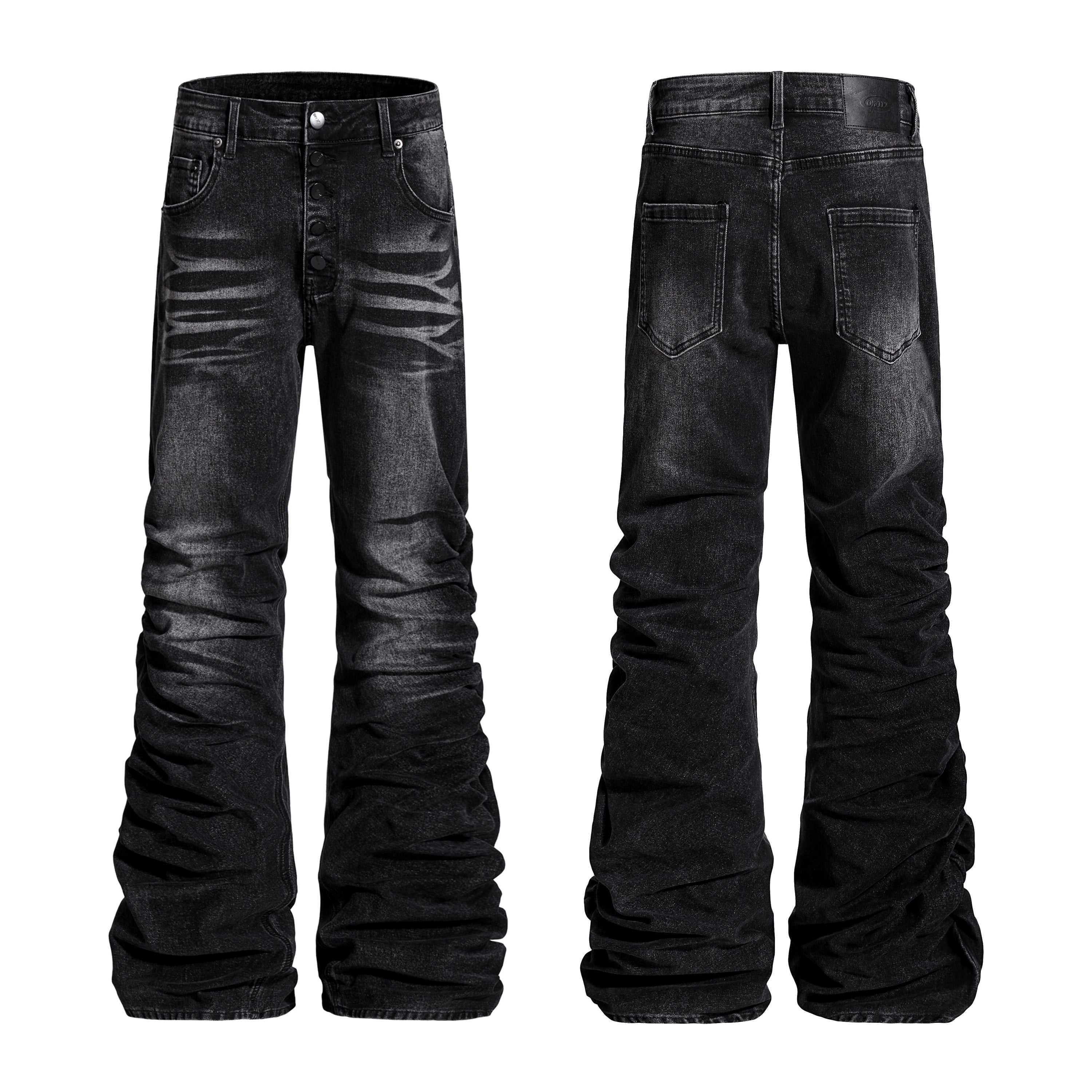 Front and back view of black washed stacked denim jeans with button fly and ruched flare leg silhouette