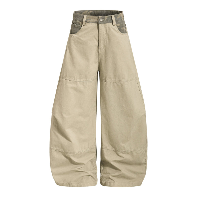 Beige wide-leg pants with camo waistband and front pockets, front view