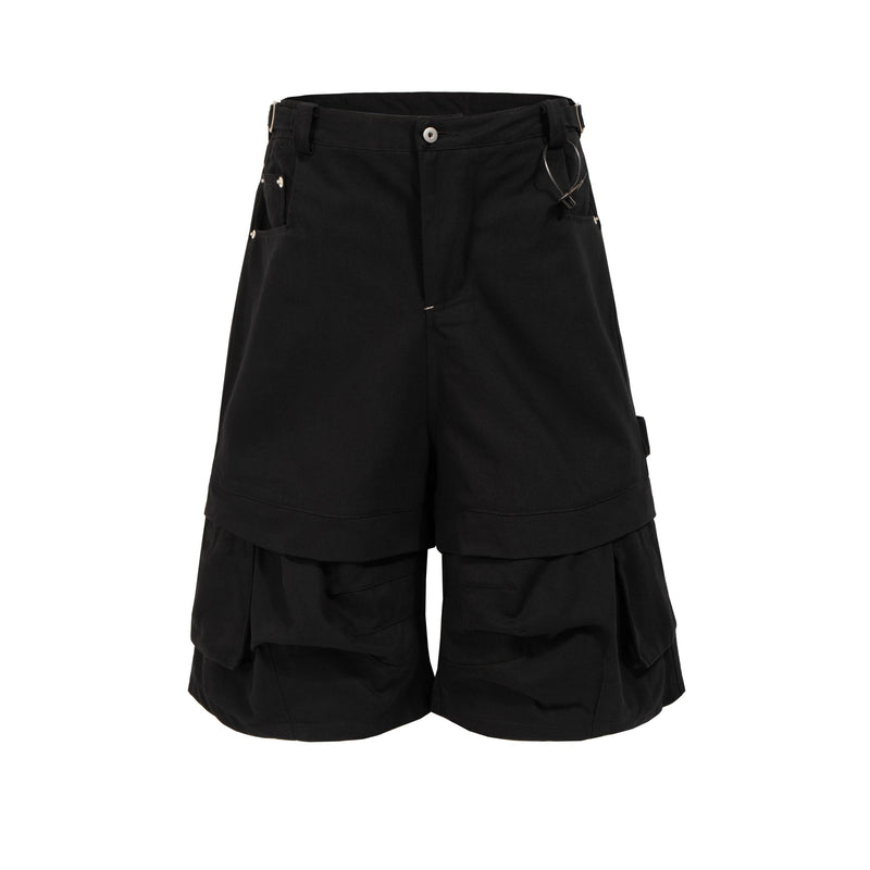 Black layered cargo shorts with side pockets and draped outer panels, front view