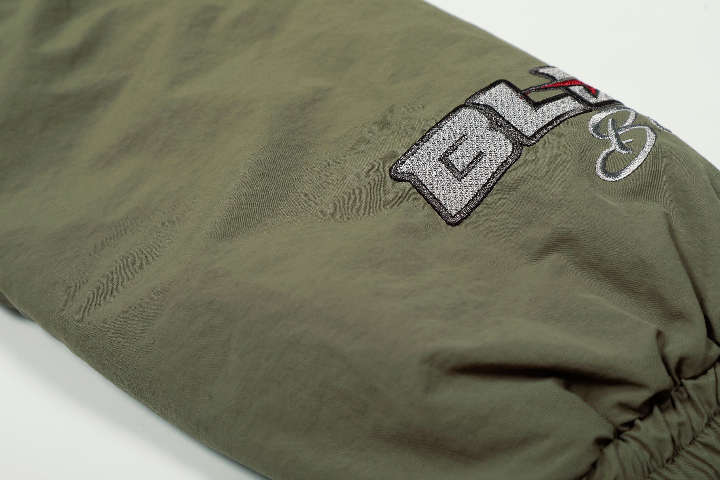 Varsity Patch Faux Fur Hooded Puffer Jacket | Army Green