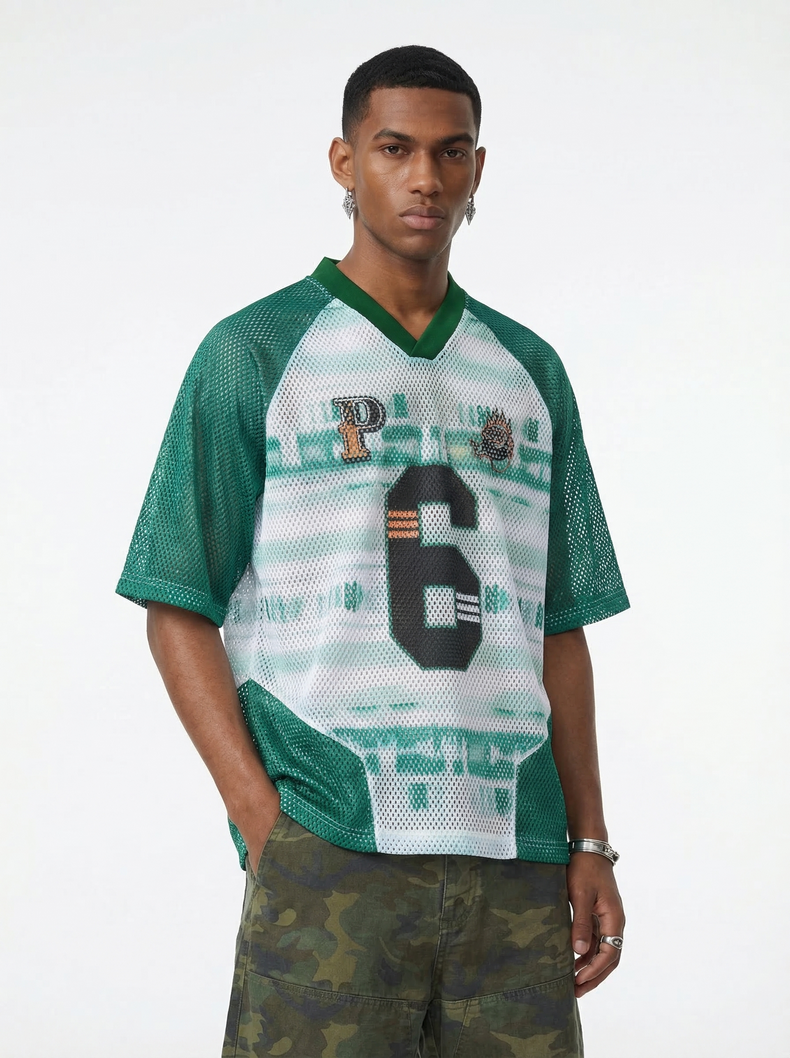 Green mesh varsity jersey T-shirt with a large number 6, white front panel, and athletic streetwear styling