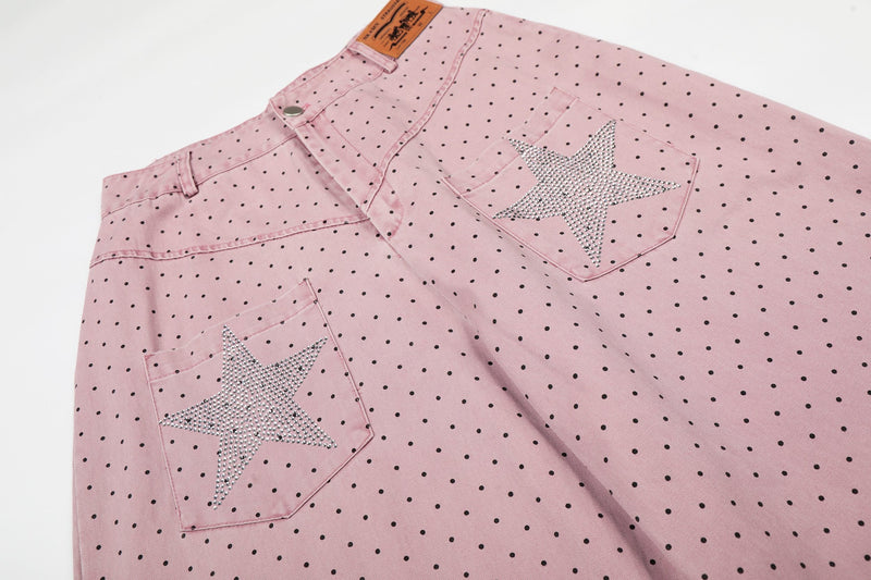 Close-up of pink polka dot pants showing both rhinestone star back pockets