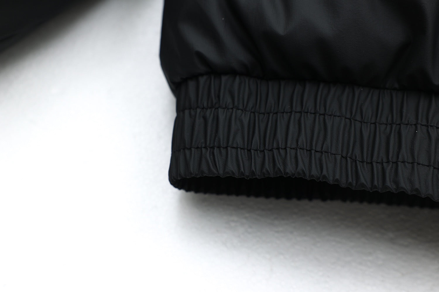 Faux-Fur Hood Puffer Jacket with Bold Red Embroidery