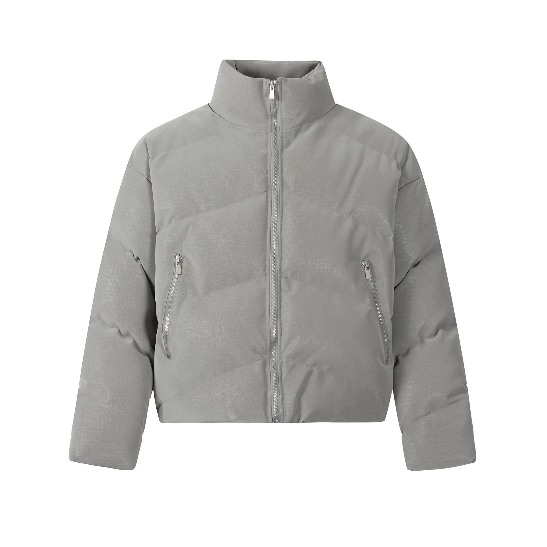 Front view of a grey cropped puffer jacket with high stand collar, full-length zip, and diagonal quilted panels