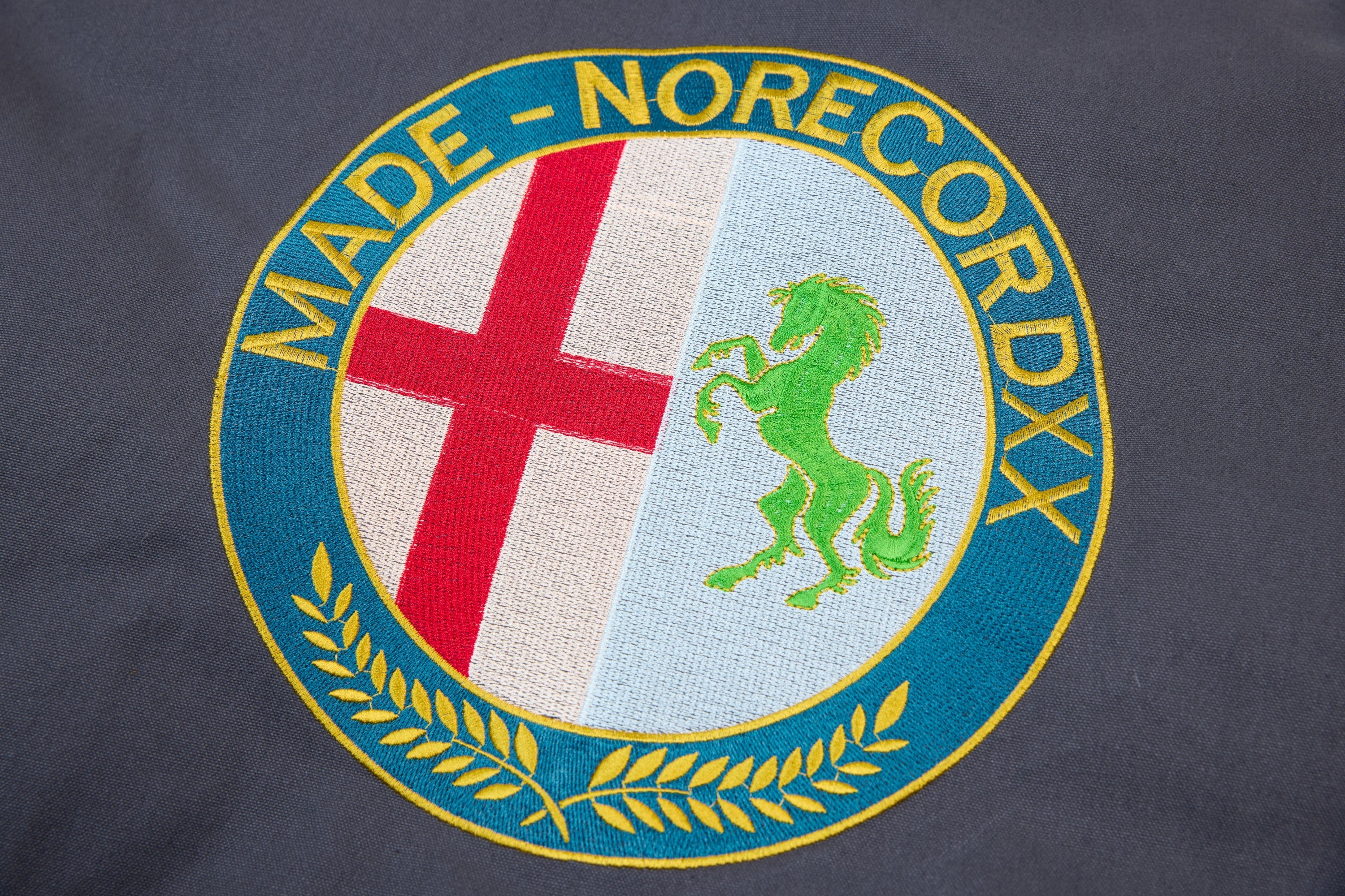 MADE NORECORDXX Embroidered Cropped Zip Jacket – Slate Blue