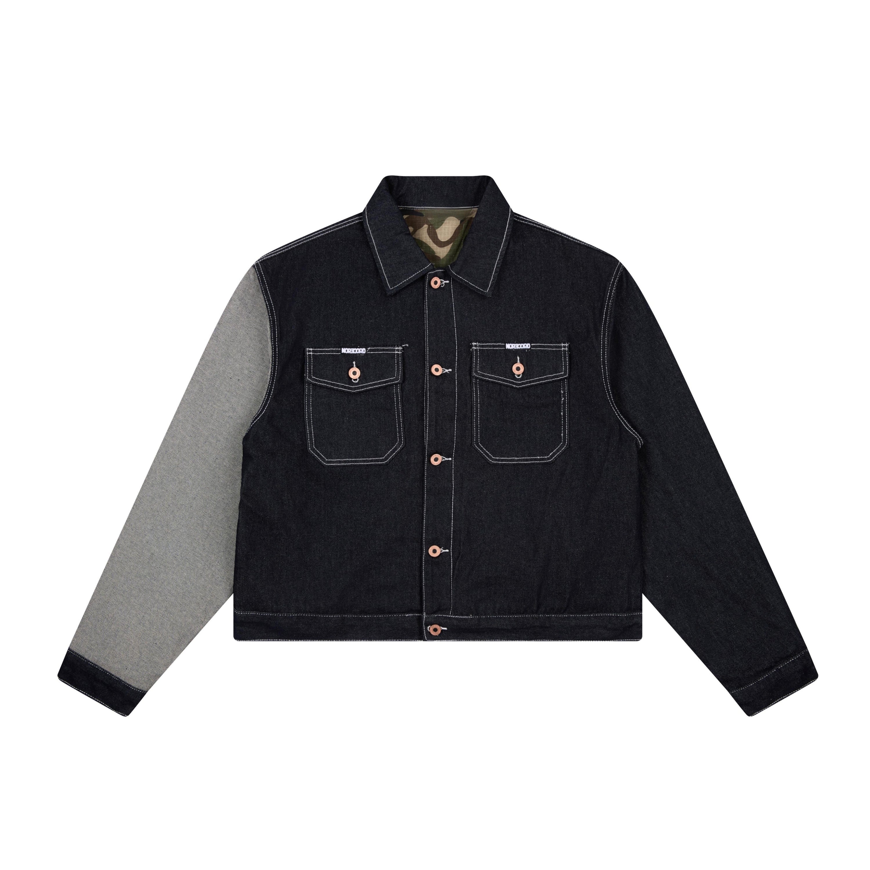 Front view of Omirad mixed-panel denim work jacket with black denim body, grey contrast sleeve, copper buttons and white cont