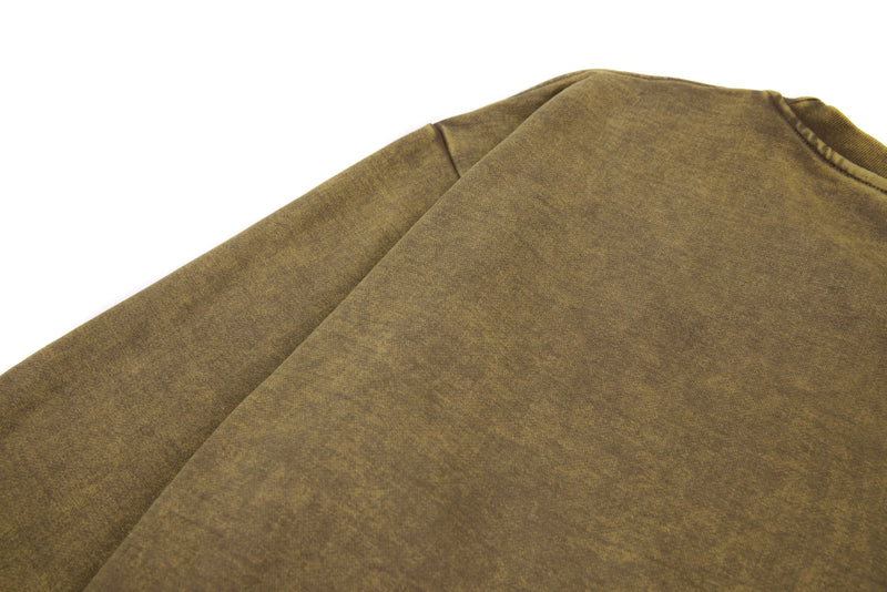 Upper back view of vintage washed brown long sleeve tee