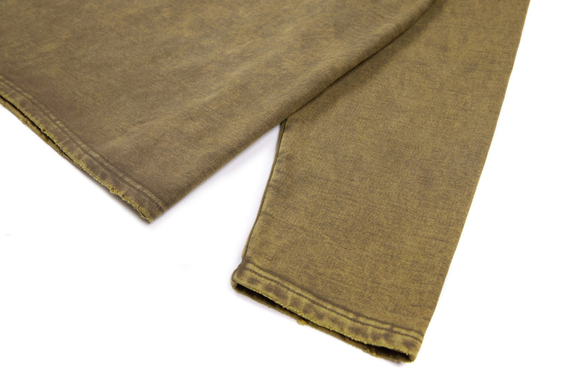 Sleeve and hem close-up on brown washed long sleeve tee