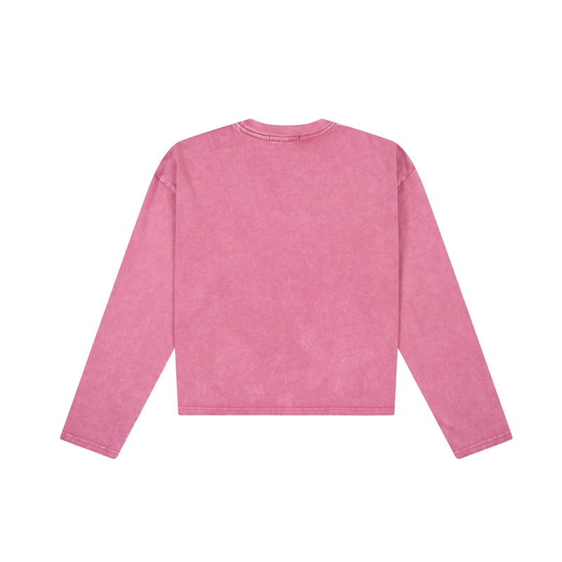 Back view of pink cropped long sleeve tee with a plain heavyweight cotton finish
