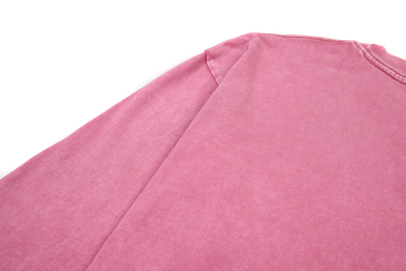 Back shoulder view of pink long sleeve cropped tee with plain fabric and seam detail