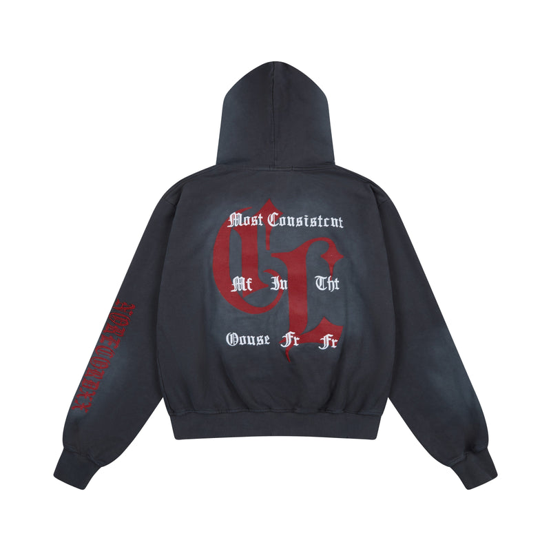 Back view of washed charcoal zip-up hoodie with red and white gothic graphic print