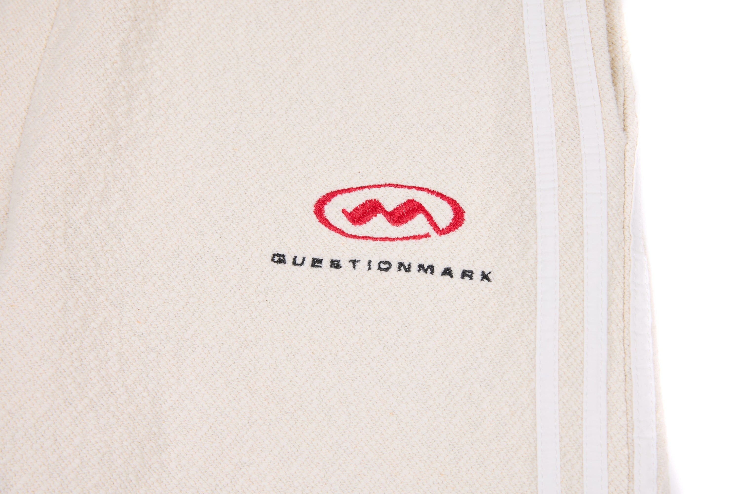 Omirad Wide-Leg Cotton Track Pants | Cream Streetwear