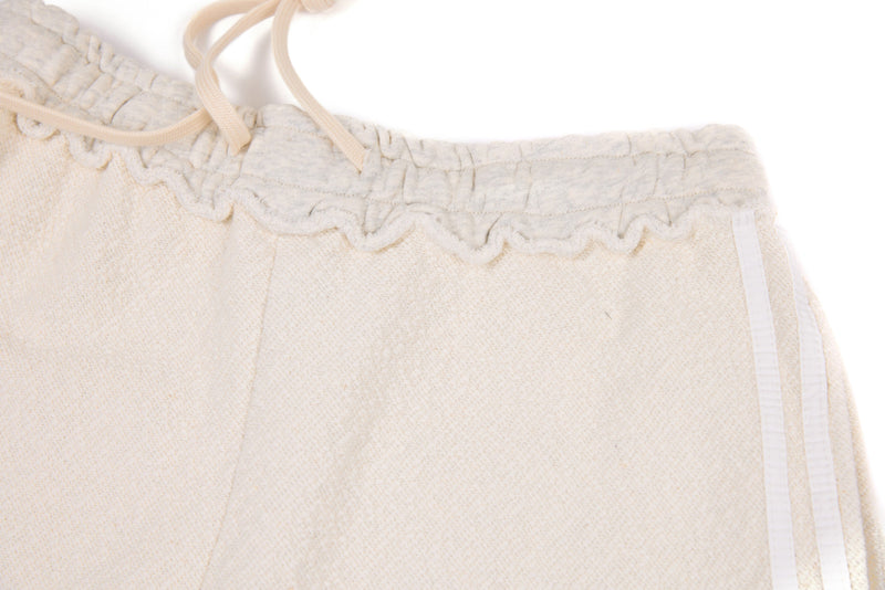 Omirad Wide-Leg Cotton Track Pants | Cream Streetwear