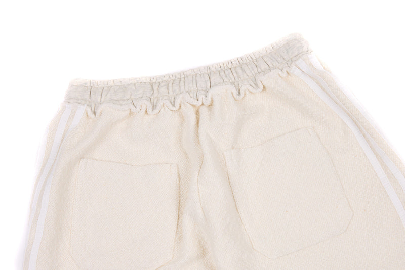 Omirad Wide-Leg Cotton Track Pants | Cream Streetwear