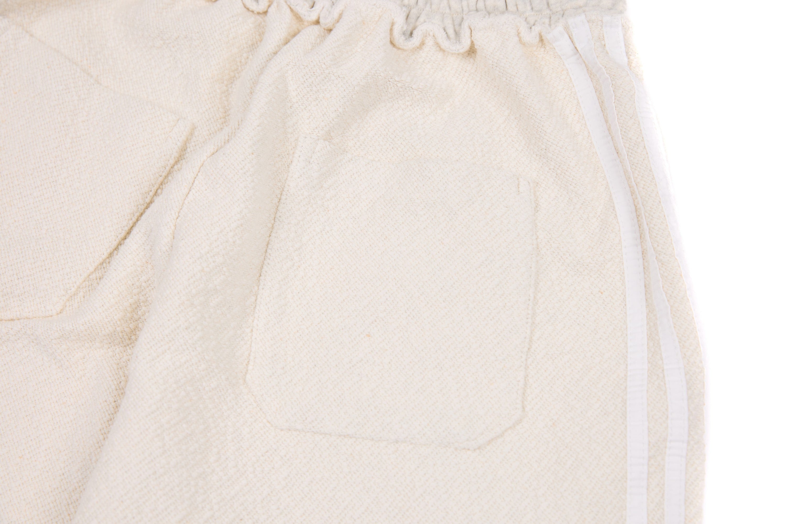 Omirad Wide-Leg Cotton Track Pants | Cream Streetwear