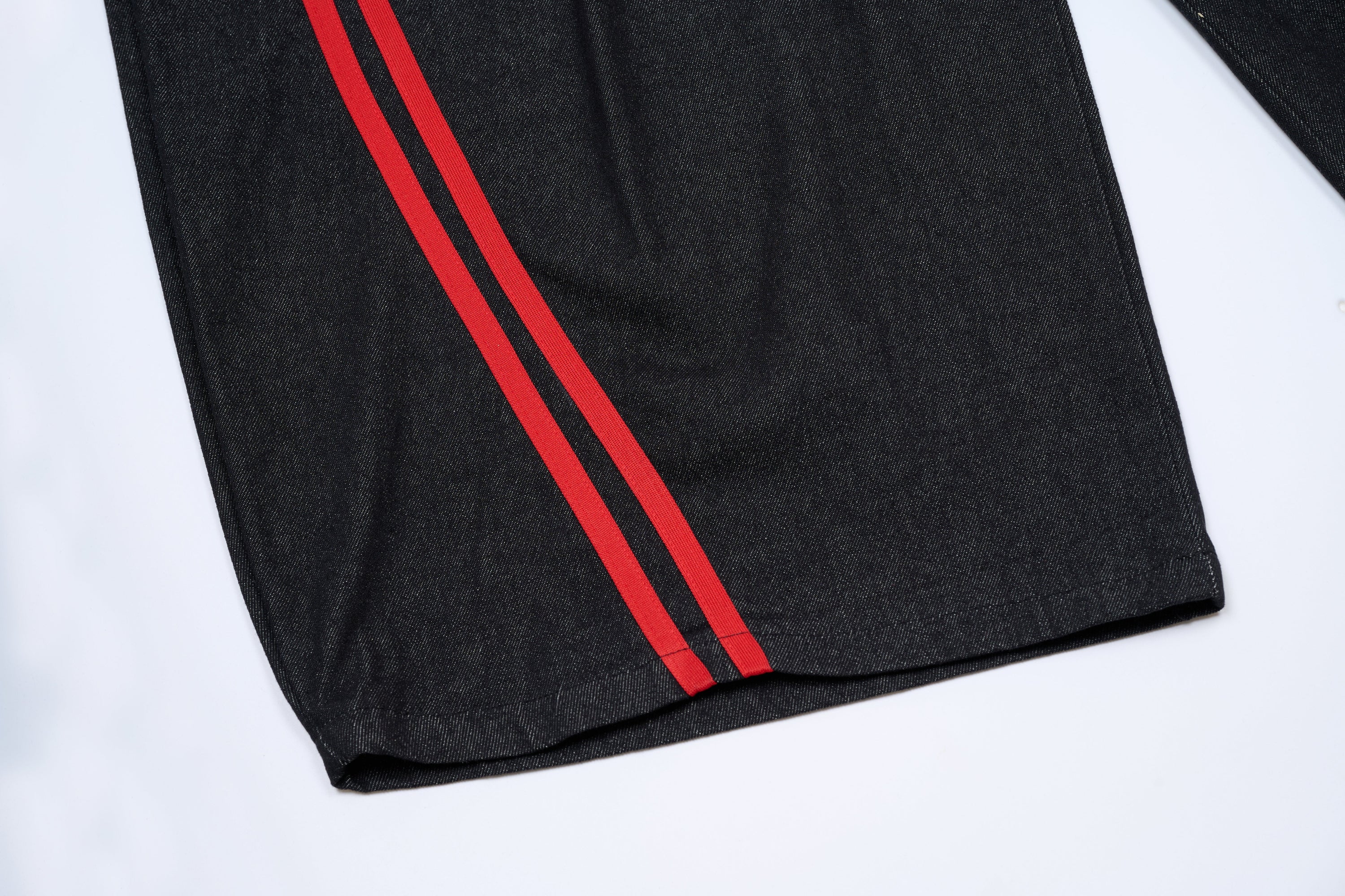 Wide-Leg Dark Denim Pants with Bold Red Side Stripes