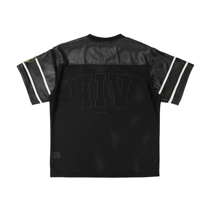 Black mesh football tee with leather-look panels and white sleeve stripes, shown flat on a white background