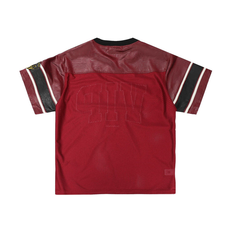 Red mesh football tee with leather-look shoulder panels, black sleeve stripes, and a streetwear jersey silhouette