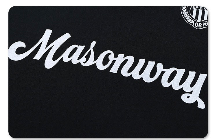 Black streetwear soccer jersey with large white Masonway script logo and small crest on the chest