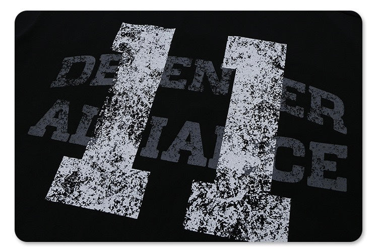 Black oversized vintage jersey T-shirt with distressed white number 11 and faded athletic lettering print