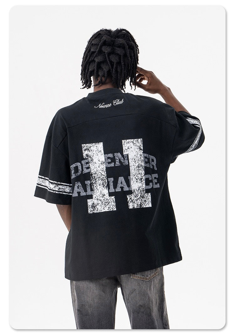 Black oversized jersey T-shirt with large distressed number 11 graphic and vintage streetwear lettering on the back