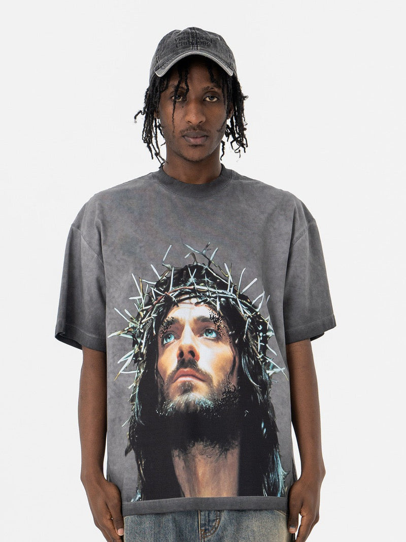 Oversized washed gray graphic tee with large Crown of Thorns portrait print on the front