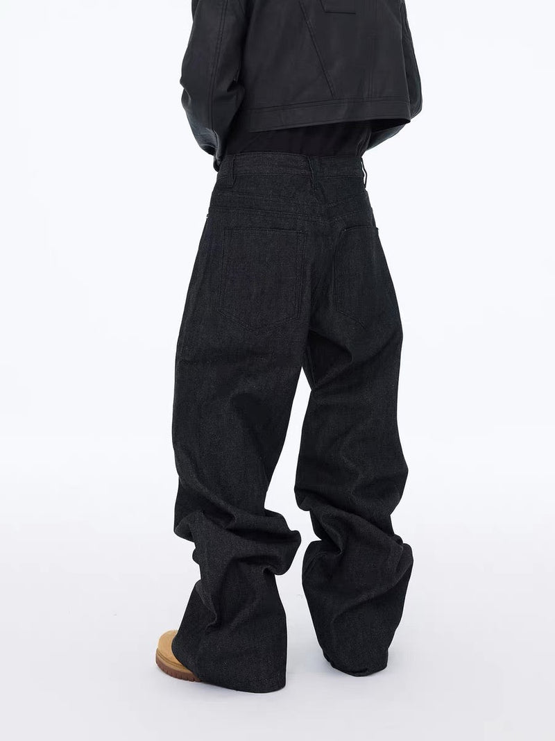 Back view of black wide-leg jeans showing the high-rise fit and full legs