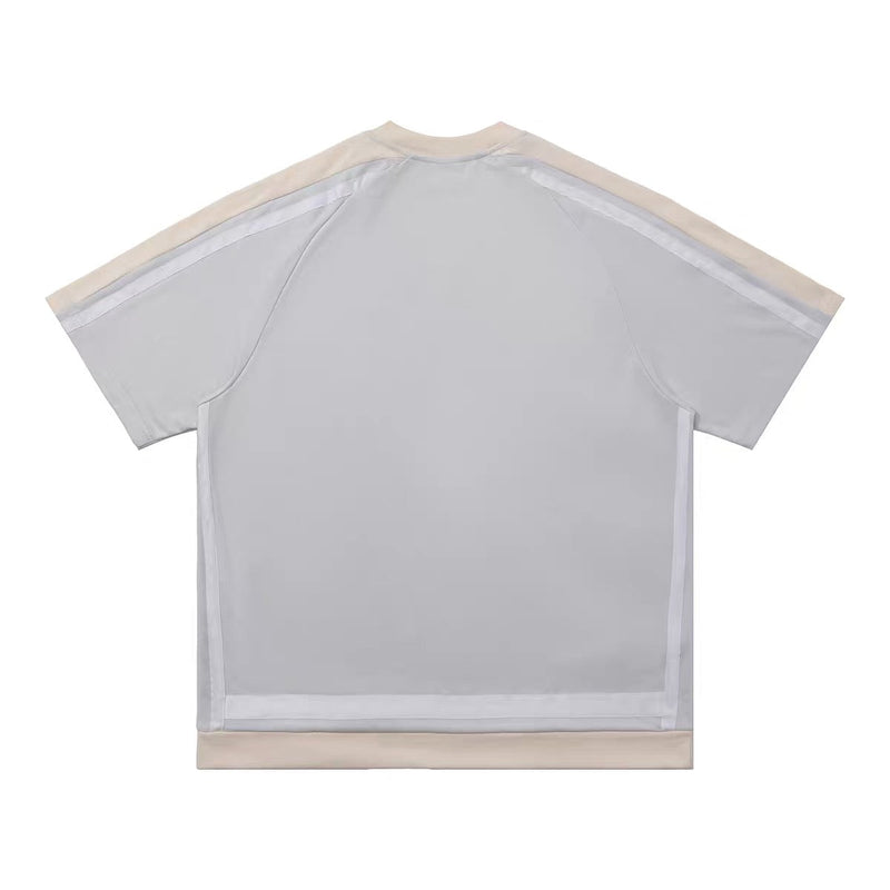 Oversized light gray varsity mesh tee with beige trim and short sleeves on white background
