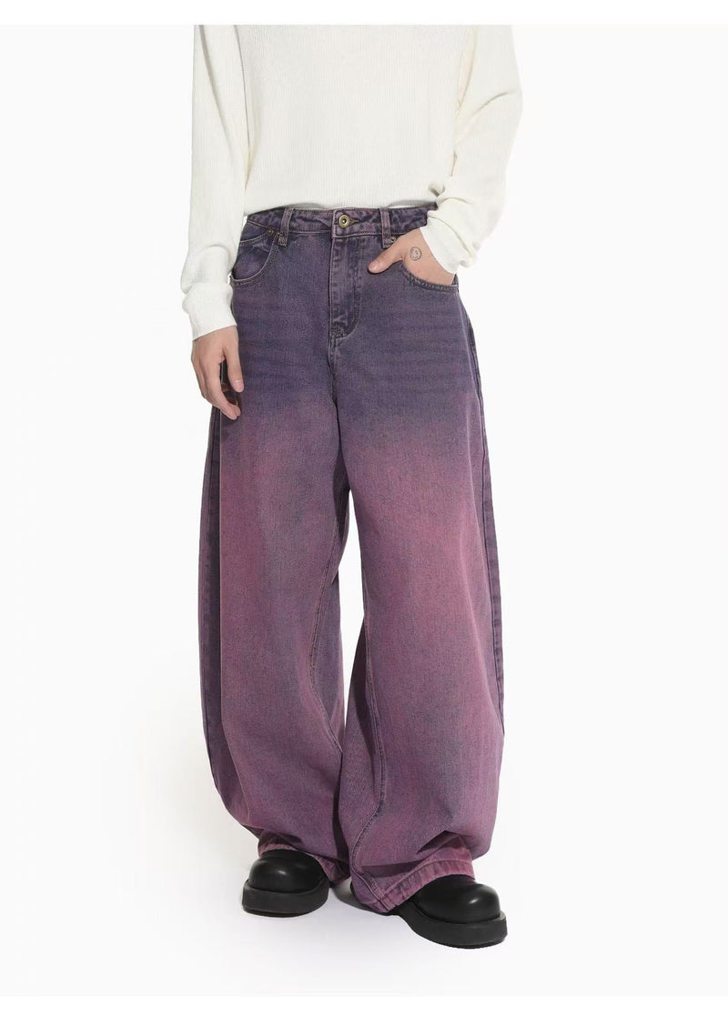 Front view of oversized purple rose denim jeans with wide legs and subtle faded wash