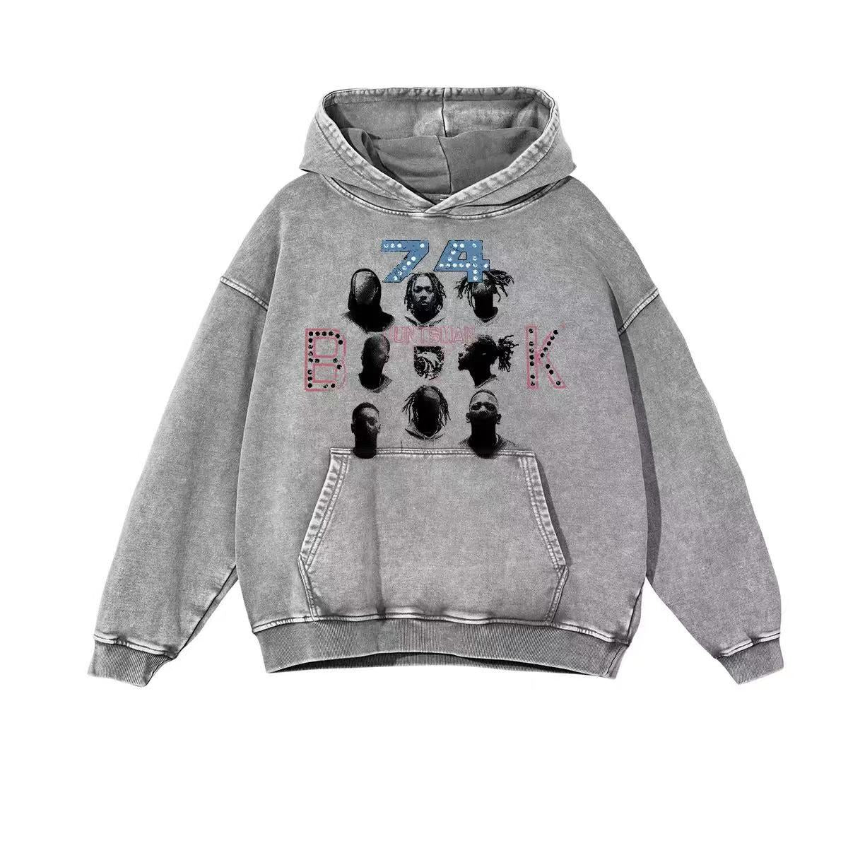 Grey acid-washed oversized hoodie with multi-portrait collage graphic and stylized 74 lettering on the front