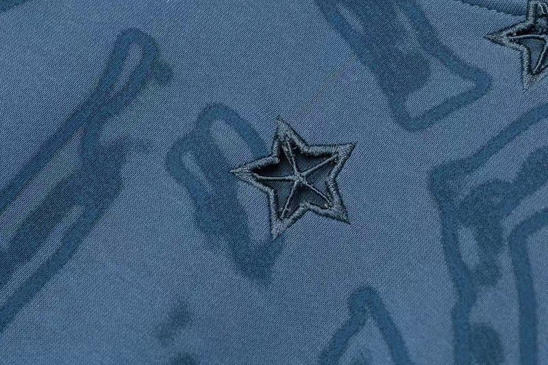 Blue hoodie close-up of star embroidery on the front graphic