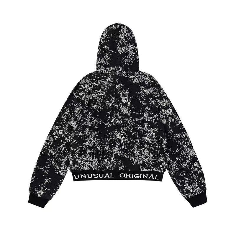 Back view of black starburst zip hoodie with ribbed hem