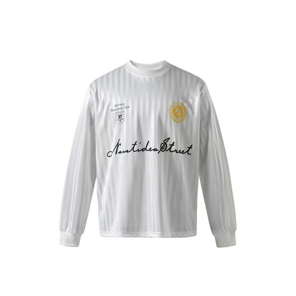 White long-sleeve mesh football jersey with embroidered crest badges and Nautidea Street script logo on the front