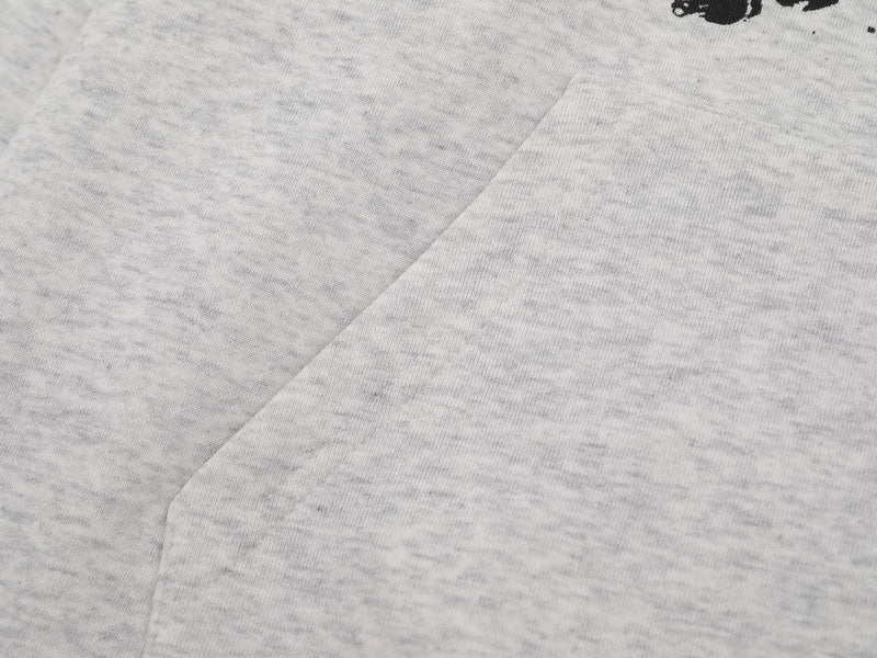 Close-up of light gray hoodie fabric and seam detail