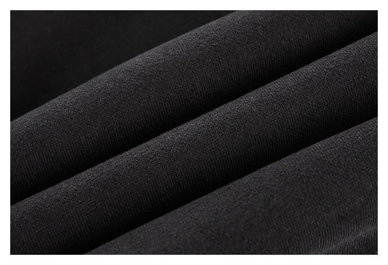 Close-up of dark hoodie fabric with soft washed texture