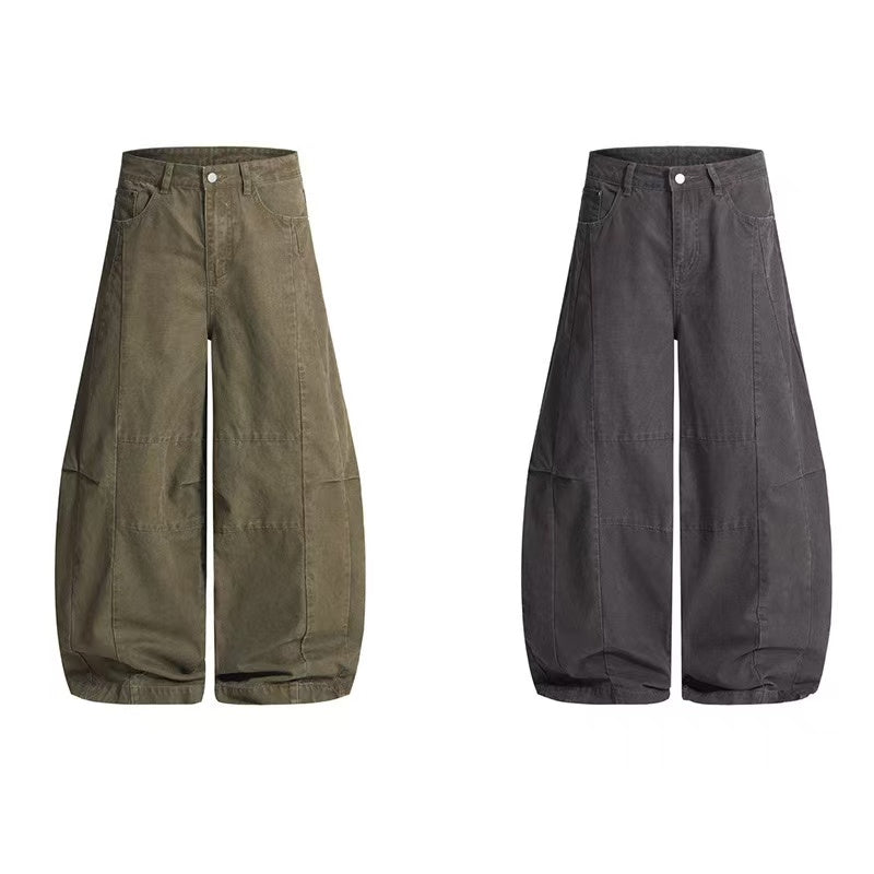 Army green wide-leg balloon utility pants with workwear panel stitching and adjustable hem, front view
