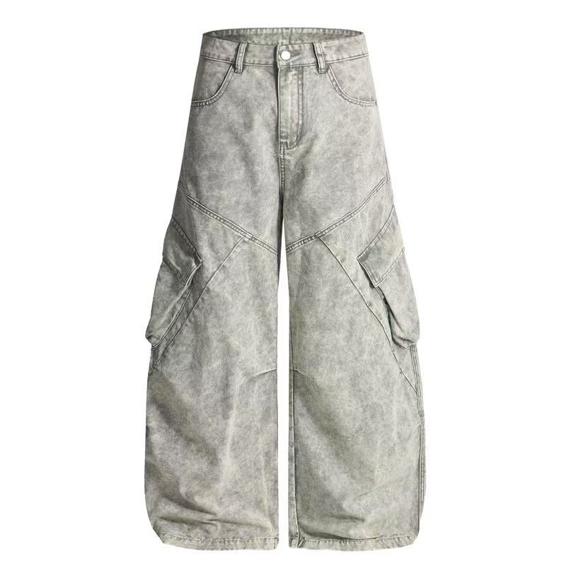 Light gray wide-leg cargo jeans, front view with paneled seams and side flap pockets