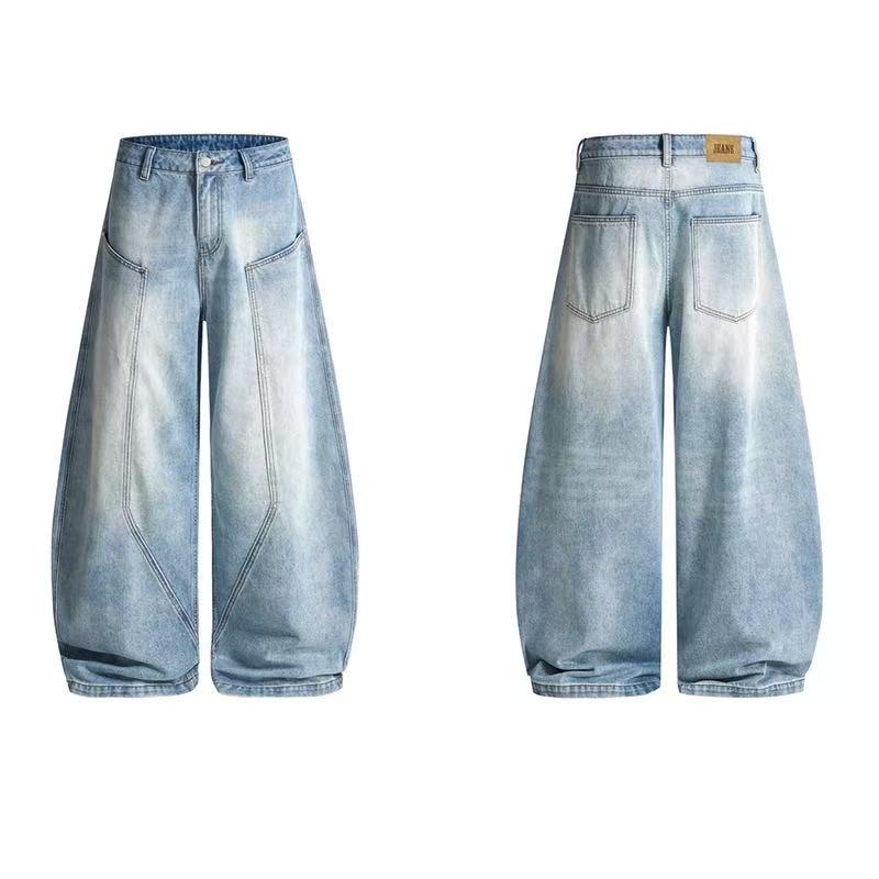 Front and back view of light wash balloon wide-leg denim jeans with panel seam detailing and oversized fit